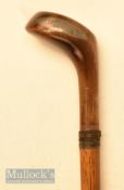 An elegant small wooden driver head golf walking stick with black triangular face insert with wooden