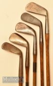 Spalding Kro flite mid iron together with 4x unnamed irons consisting of 2x mashies, a lofted mashie