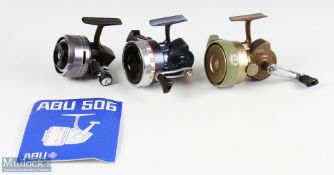 2x French Crack Contact closed face reels finished in blue and another in green with drag