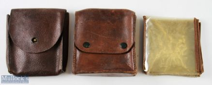 M C Thorburn Edinburgh leather cast wallet together with another unnamed cast wallet with plastic