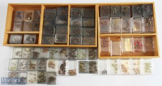 Quantity of professionally tied fly-fishing flies featuring a wide variety of dry and wet