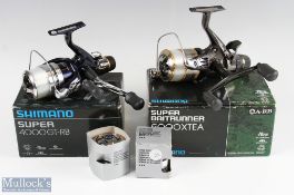 Shimano Baitrunner 5000 XTEA spinning reel and spare spool together with Shimano 4000GT-RB