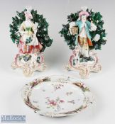 Pair of 19th century Sampson after Derby Figures one of a man holding bird cage with a dog and the