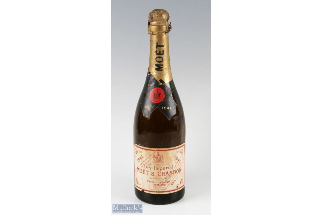 1941 Moet & Chandon Dry Imperial Champagne with some minor label wear and markings - Image 1 of 2