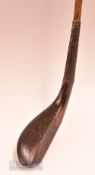 Elegant and early R Simpson Carnoustie dark stained beech wood long nose curved face play club c1880