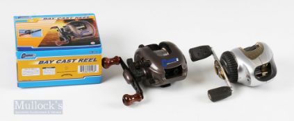 Cummins Bat Cast Baitcasting Reel with twin wooden handles, in original box appears unused, together