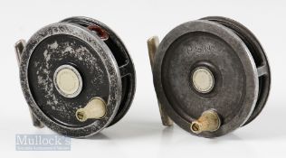 2x Ogden Smith ‘Exchequer’ 3” alloy fly reels with one finished in black with a red agate sliding