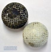 2x guttie moulded square mesh pattern golf balls - one repainted white and the other large used