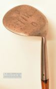 Cochrane's Mammoth niblick stamped with retailers details Stokes and Co London, multi-dot punched