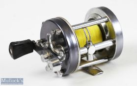 Abu Ambassadeur 6500C high speed multiplier reel, silver smooth end plates, 3 screw, free spool,