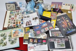 A PINK PLASTIC TUB WITH A COLLECTION OF MAINLY GB STAMPS, main value in GB face value from late