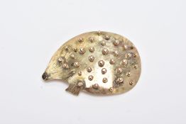 A 9CT GOLD BROOCH, in the form of a hedgehog with a ball detailed body and a round brilliant cut