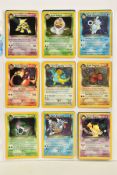 A COMPLETE POKEMON TEAM ROCKET CARD SET, including the 'secret' Dark Raichu card (83/82), cards in