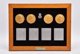 A WOODEN FRAME APPROXIMATELY 36CM X 27CM CONTAINING WHAT IS BELIEVED TO BE A SOLID SILVER BADGE
