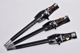 THREE X 1907 PATTERN SMLE DRESS BAYONETS, in high gloss belt frogs and scabbards, the grips being