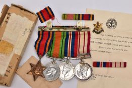 AN OFFICIAL BOXED GROUP OF WWII/GENERAL SERVICE MEDALS to include Burma Star, Defence & War medal (