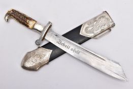 AN EXAMPLE OF A WWII GERMAN R.A.D. EM DAGGER AND SCABBARD, 'Arbeit Adelt' engraved to blade, the