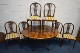 A LATE VICTORIAN FIGURED QUARTRED WALNUT AND MARQUETRY INLAID LOO TABLE, length 130cm x depth