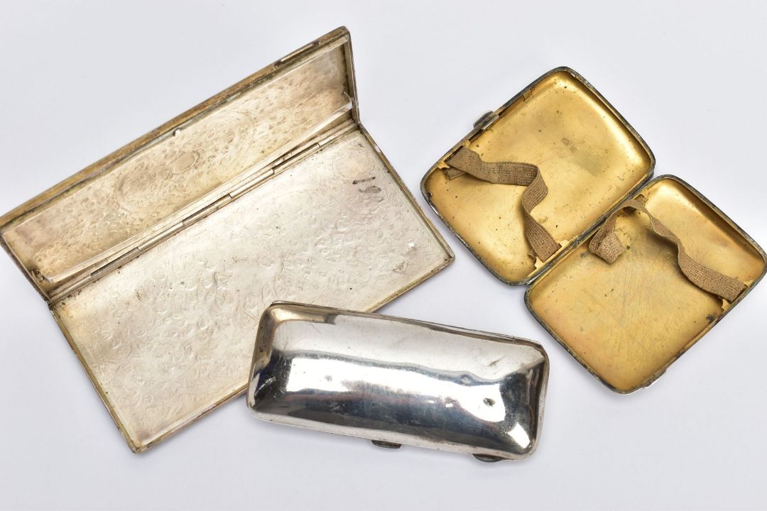 THREE CIGARETTE CASES, to include two early 20th century silver cigarette cases with gilt interiors, - Image 2 of 3