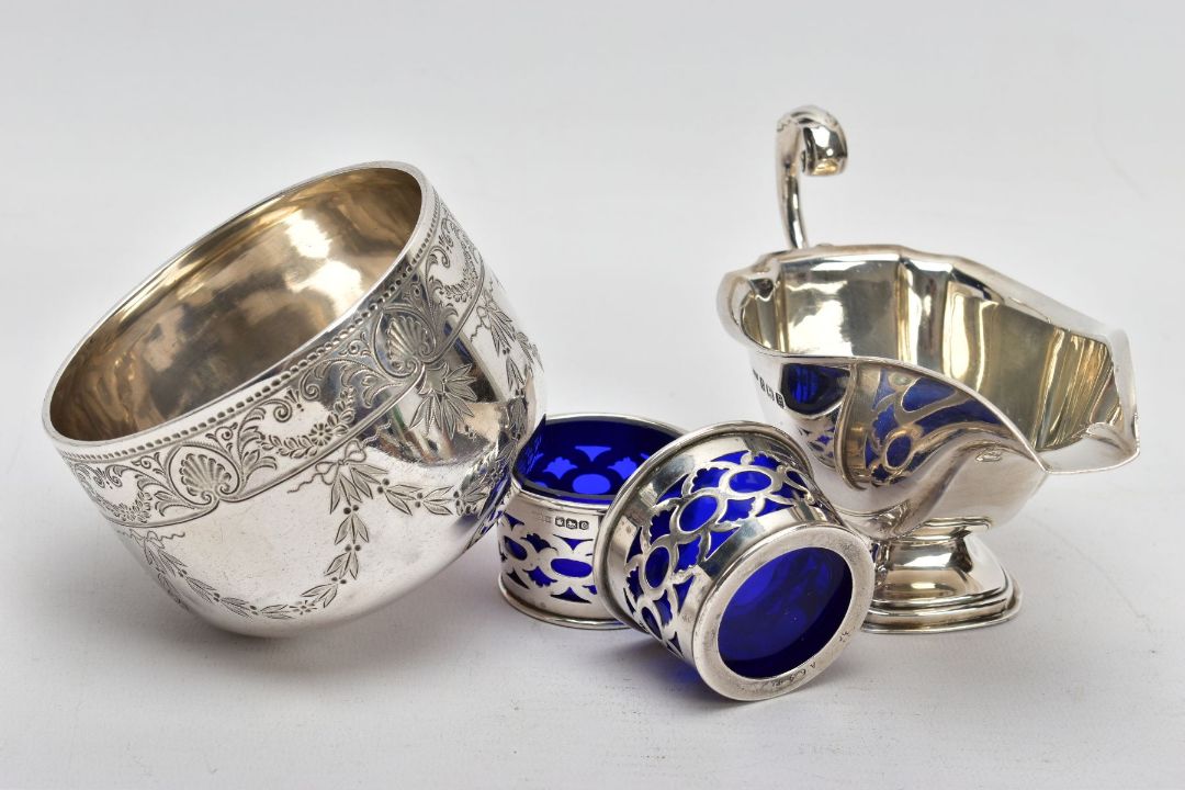 FOUR ITEMS OF SILVERWARE, to include a late Victorian silver sugar bowl with engraved swag, shell - Image 5 of 5