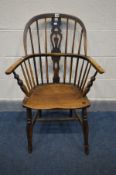 A LATE 18TH CENTURY OAK WINDSOR ELM CHAIR, hoop back, pierced splat, bowed mid rail, H stretcher,