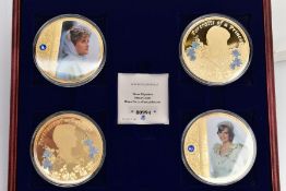 A CASED SET OF FOUR LARGE COMMEMORATIVE COINS, the collection called 'Portraits of a Princess