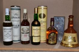 WHISKY, five bottles comprising of one bottle of Laphroaig Single Islay Malt, 10 years old, fill
