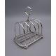 An Asprey silver toast rack , a silver handled button hook and a silver teaspoon. - Image 2 of 15