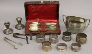 A quantity of various silver items, including napkin rings, candlesticks, etc. 11.