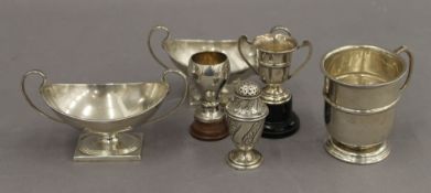 A quantity of silver items, including twin handled pedestal salts. The salts 12 cm wide.