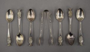 A cased set of silver seal top teaspoons and tongs. 104 grammes.