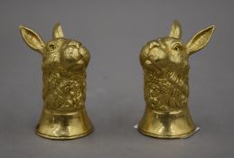 A pair of gilt cruets formed as hares. 6.5 cm high.
