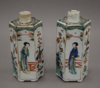 A pair of 18th century Chinese porcelain hexagonal tea caddies. Each 16.5 cm high.