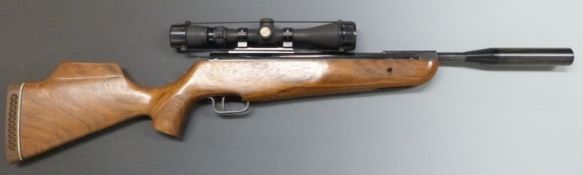 Theoben .22 air rifle with semi-pistol grip, adjustable trigger, raised cheek piece, sound moderator