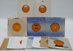 Promo / Demo - 14 singles on orange London, mostly single sided with stamped numbers