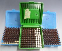 Two-hundred-and-fifty-seven 7.62mm/.308 rifle cartridges together with various empty cases, in three