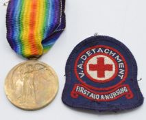 WW1 Victory Medal named to J Roberts, Voluntary Aid Detachment, together with a cloth VAD badge