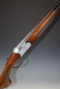 Beretta 686 Special 20 bore over and under ejector shotgun with with all over floral engraving,