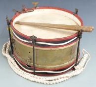 A military style side drum with sticks, diameter 31cm