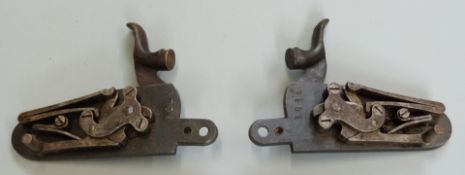 A pair of percussion hammer action gun locks with line engraved plates impressed 5756.