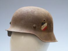 German WW2 steel helmet with two decals, replacement inner