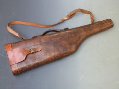 Vintage leather leg of mutton gun case with shoulder strap and fitted interior, 78cm long.