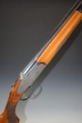 Rizzini 12 bore over and under ejector shotgun with engraved sidelock plates, trigger guard,