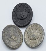 Three German WW2 Third Reich Nazi Wound badges, one marked '26' to reverse, another '3'