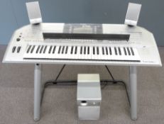 Yamaha Tyros 2 digital workstation / keyboard / electric piano on stand together with a Yamaha