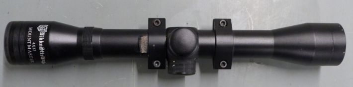 Nikko Stirling Mountmaster 4x32 rifle scope with scope mounts.