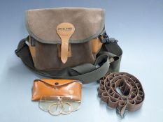 Jack Pyke leather shotgun cartridge bag together with a pair of Stirling shooting glasses in leather