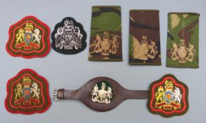 Eight Warrant Officer Class 1 rank badges including a silver wire and wrist band examples etc