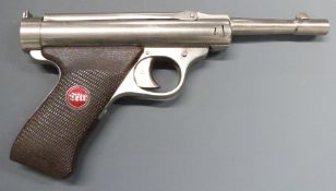 Tell Model 3 6mm air pistol with shaped and chequered Bakelite grip, inset maker's logo, top plate