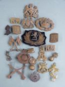 Twenty military badges including Royal Marines, REME, Royal Artillery, proficiency badges etc